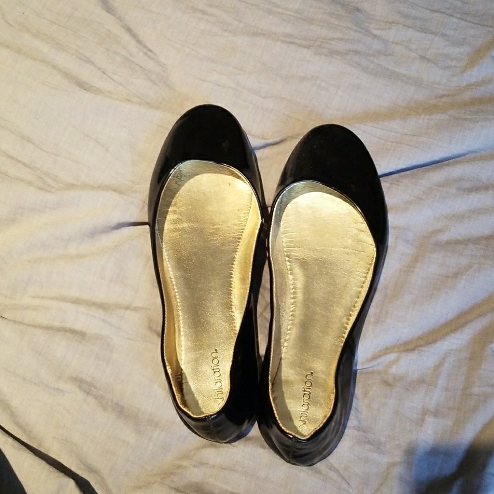 Shiny black flats